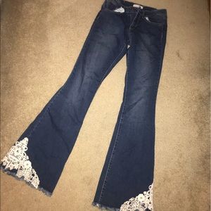 Flared jeans with crochet detail